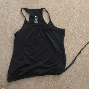Racerback workout tank that ties on the bottom